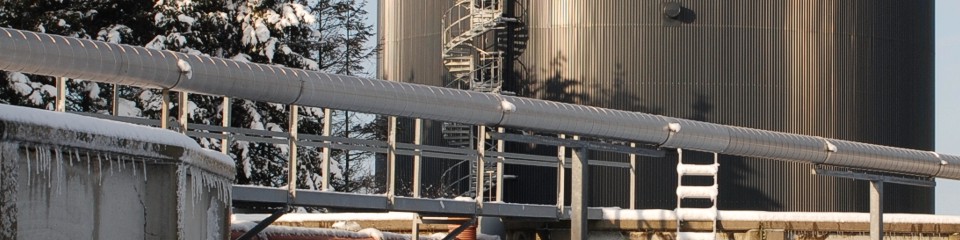 Lemvig Biogasanlægs fire reaktortanke. Tre tanke á 2400 m3 og én tank á 7100 m3